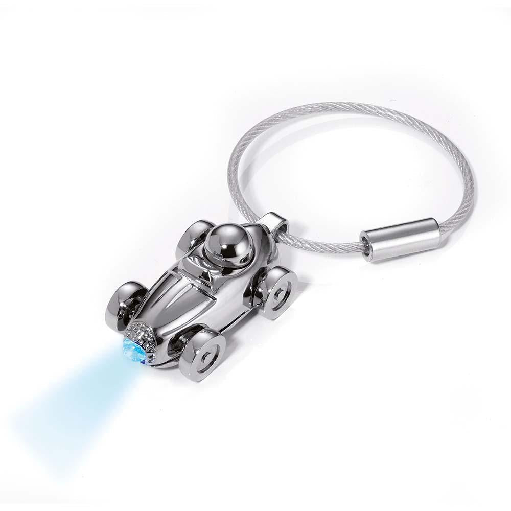 TROIKA Keyring with blue LED light LIGHT RACER